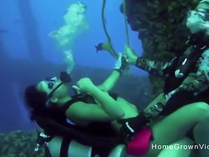 Fucking this busty cutie underwater while scuba diving