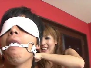 Horny Asian beauty engulfs a big dong in serious porn show